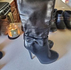 Knee high stiletto boots